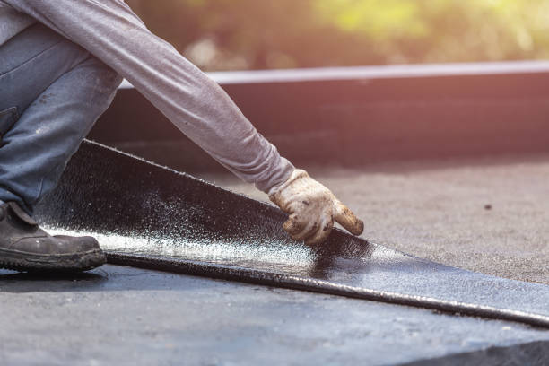 Professional Basement Waterproofing technician working in Derby, NY
